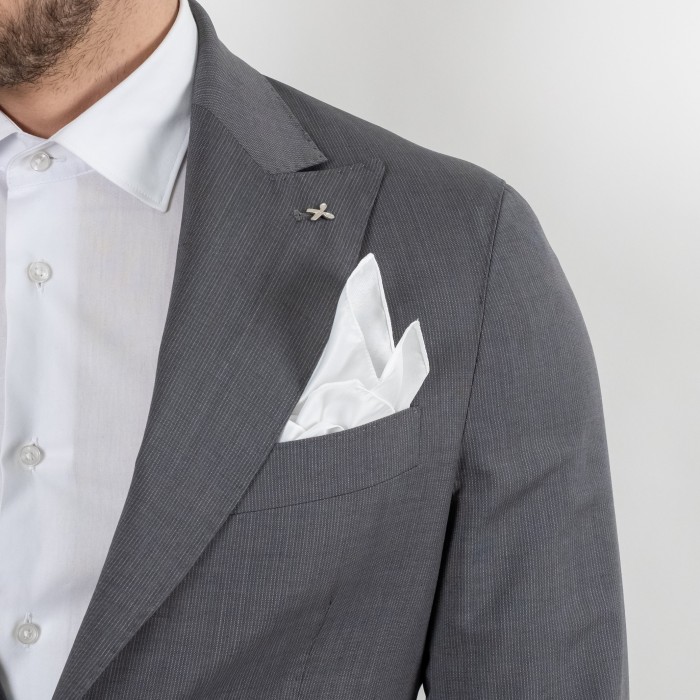 Abito monopetto grigio chiaro petto a...