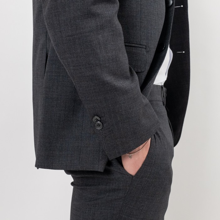 Abito monopetto grigio in lana...