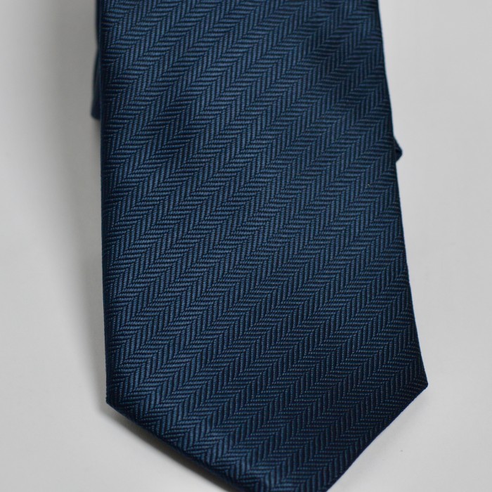 Cravatta blu spigata
